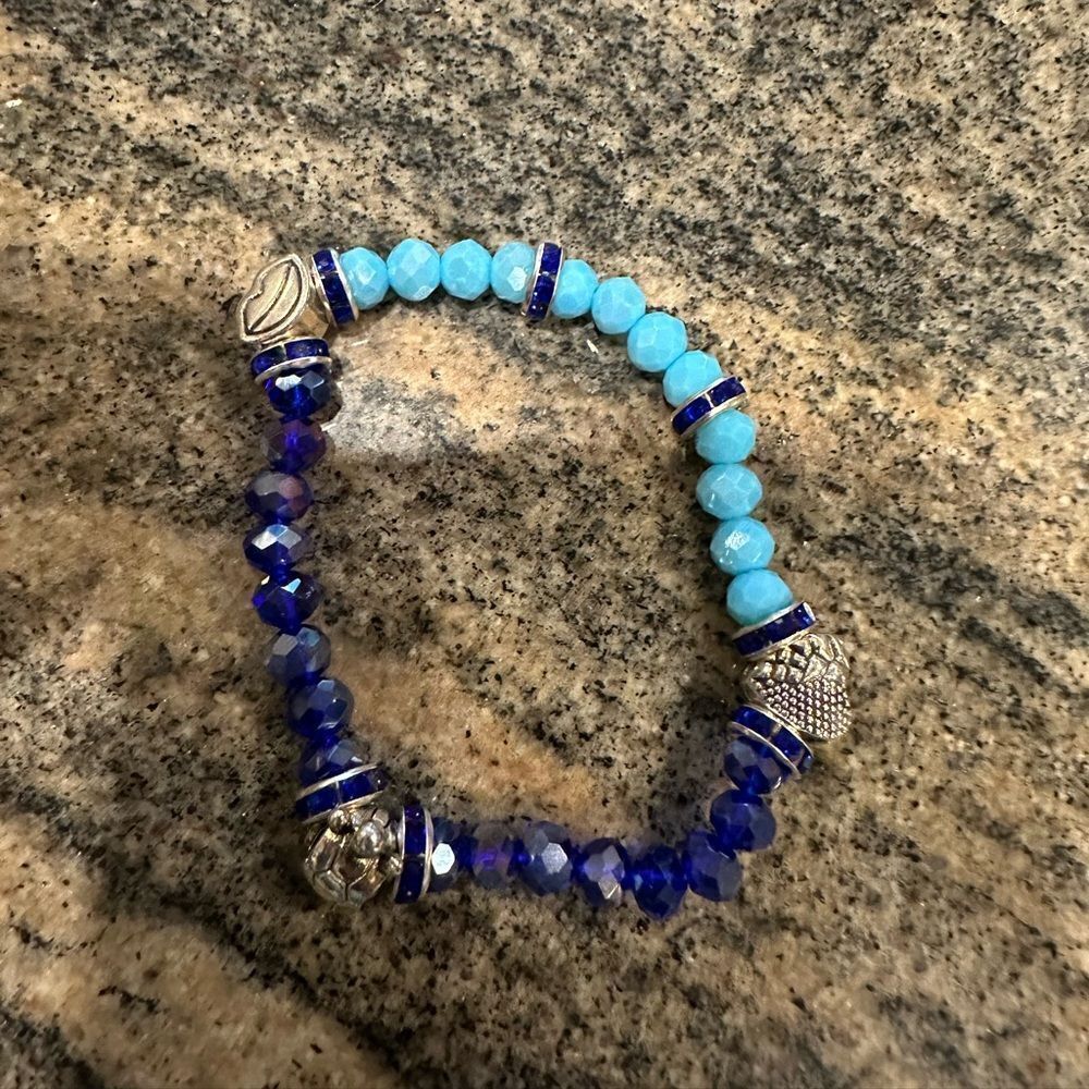 Handmade blue beaded stretch bracelet silver charms